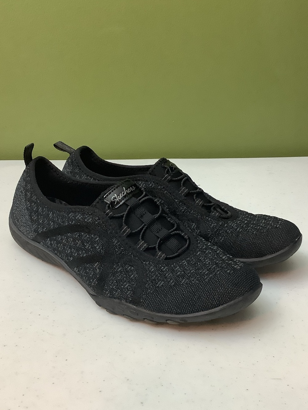 Skechers Relaxed Fir Air-Cooled Memory Foam black slip ons, size 8.5